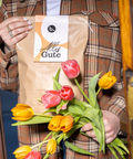Alles Gute Brotbeutel mit Blumen in der Hand 
